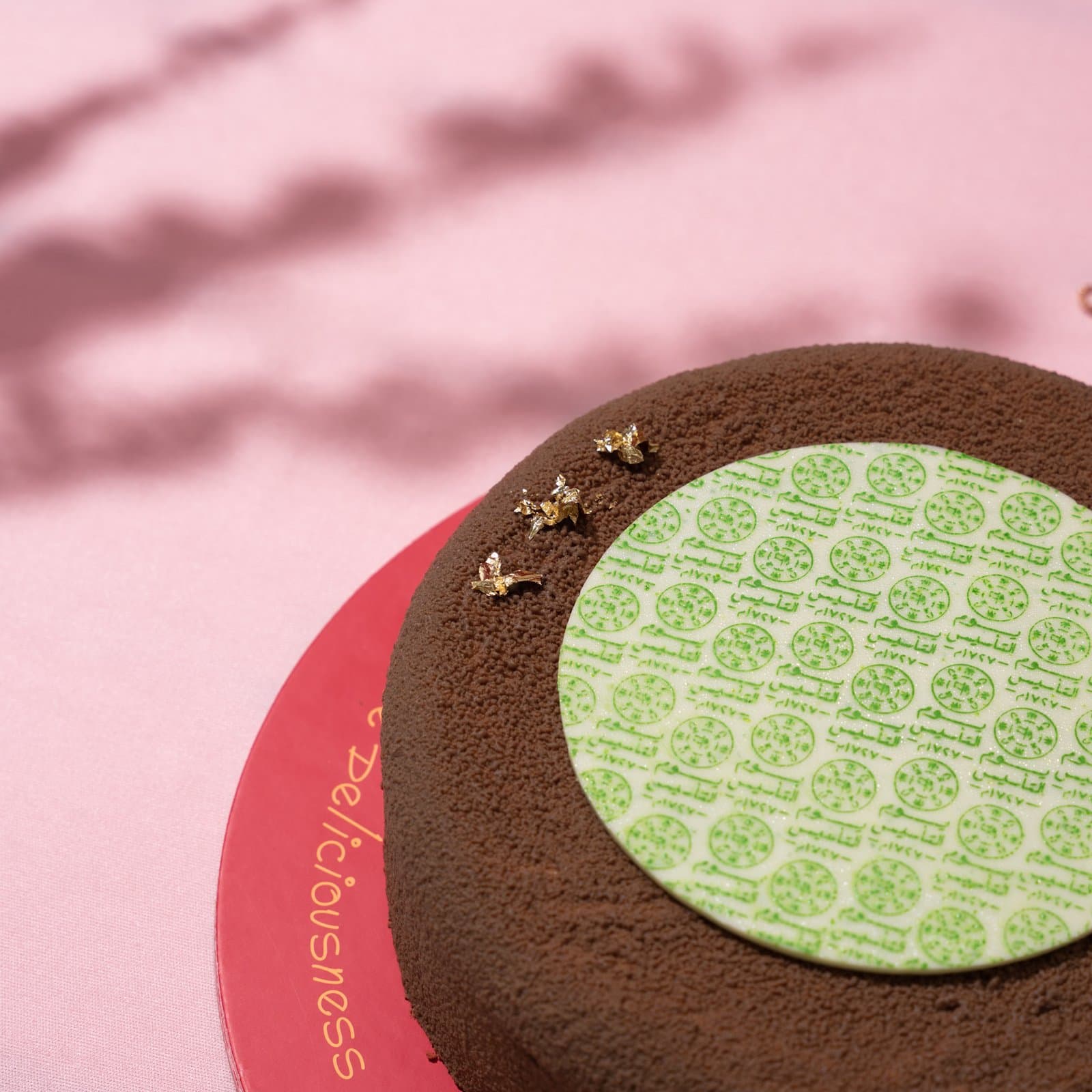 The Right seal — the brand's ornamented medallion on a cake