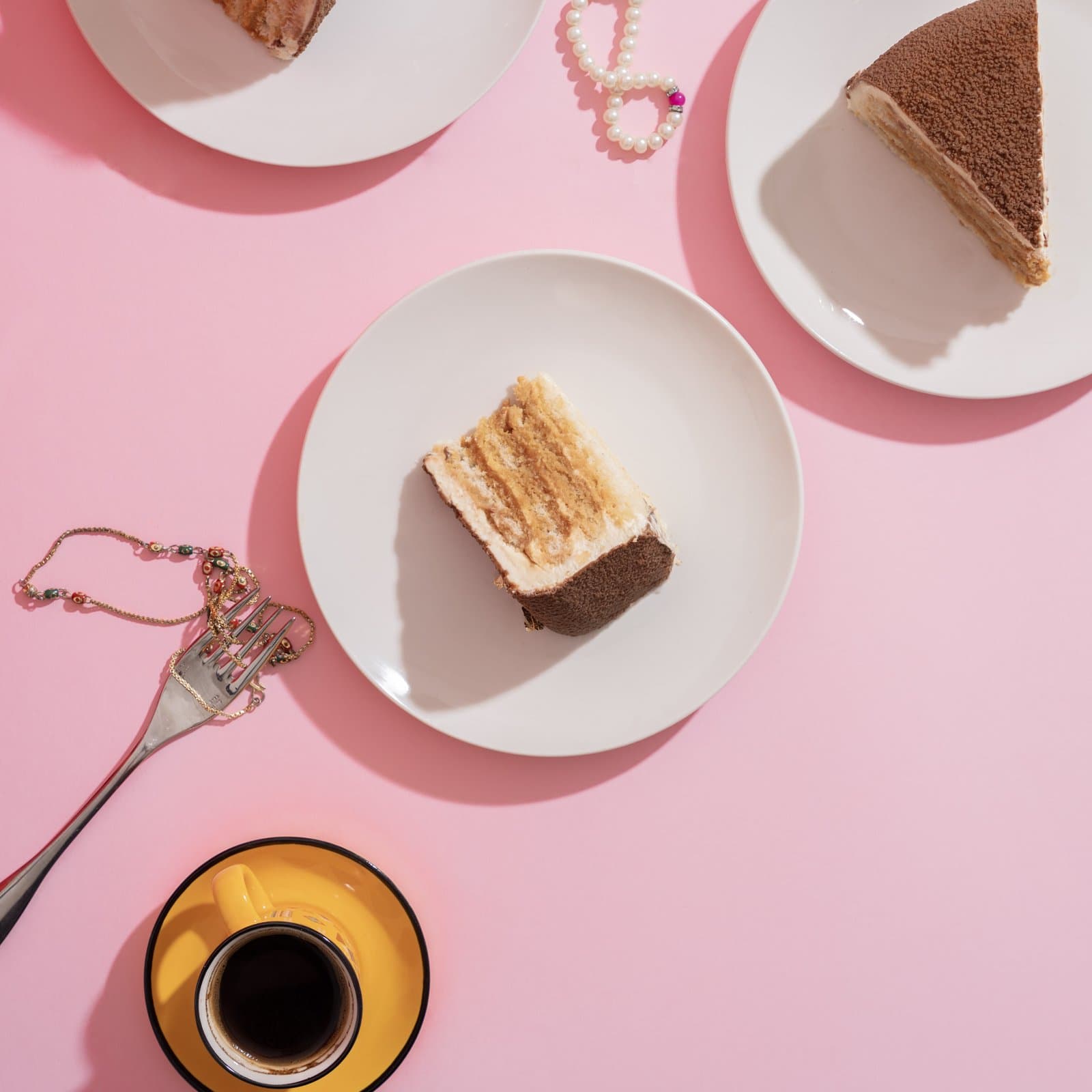 The layered cross-section and a plated slice with coffee